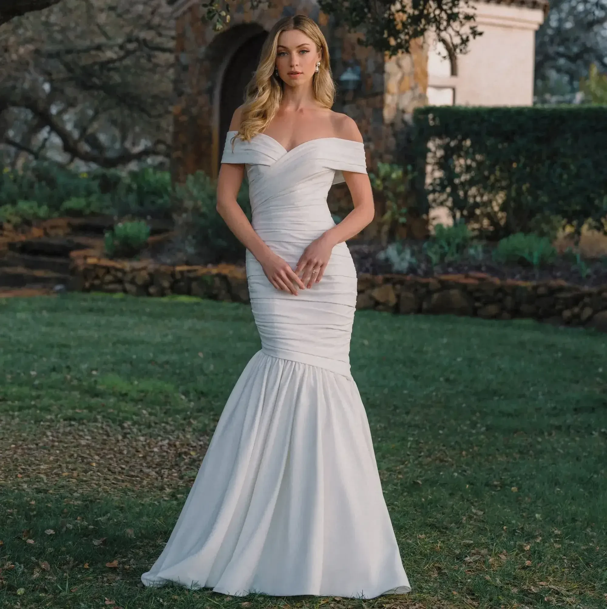 Model wearing a gown by Allure Bridals
