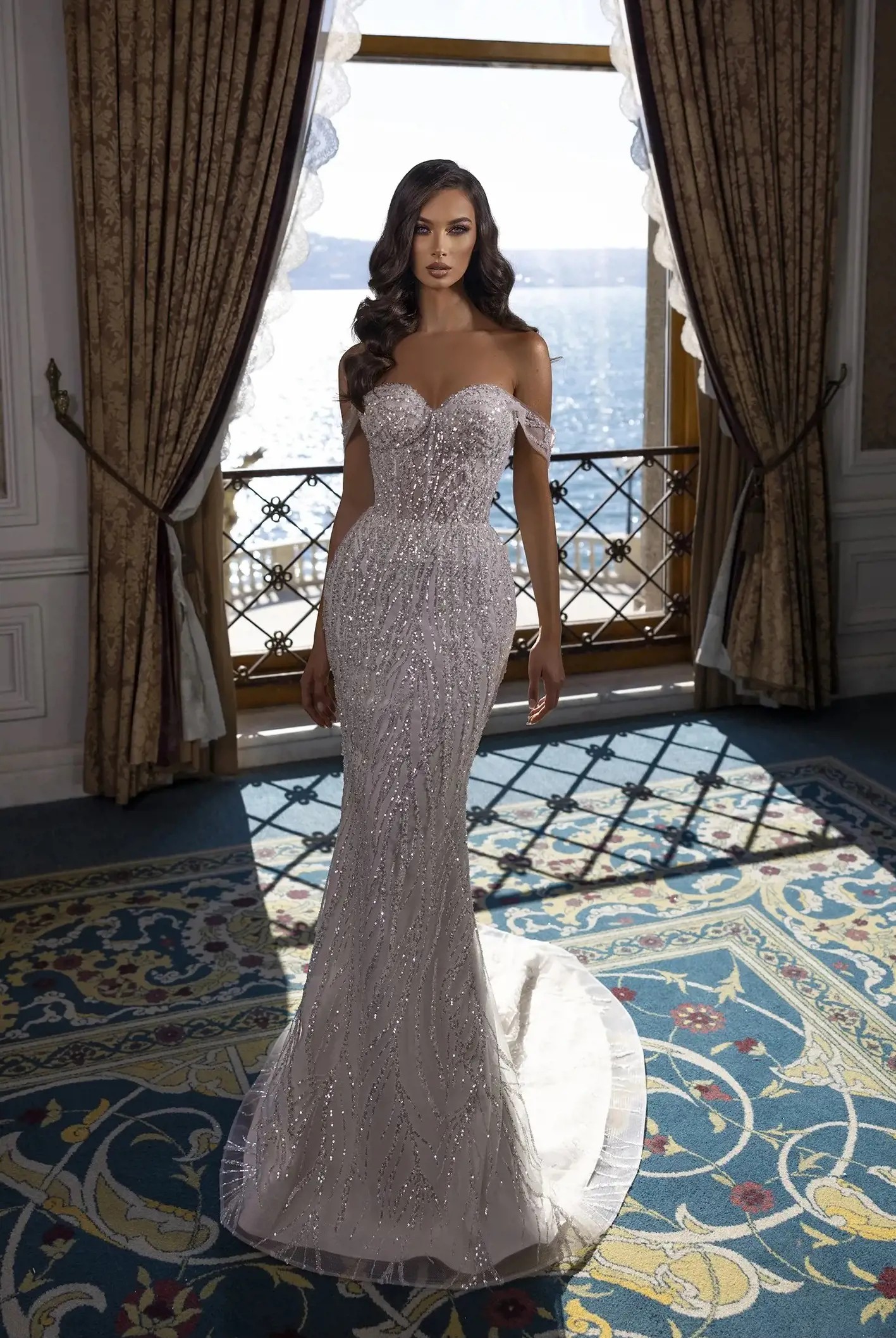 Model wearing a gown by Sima Couture