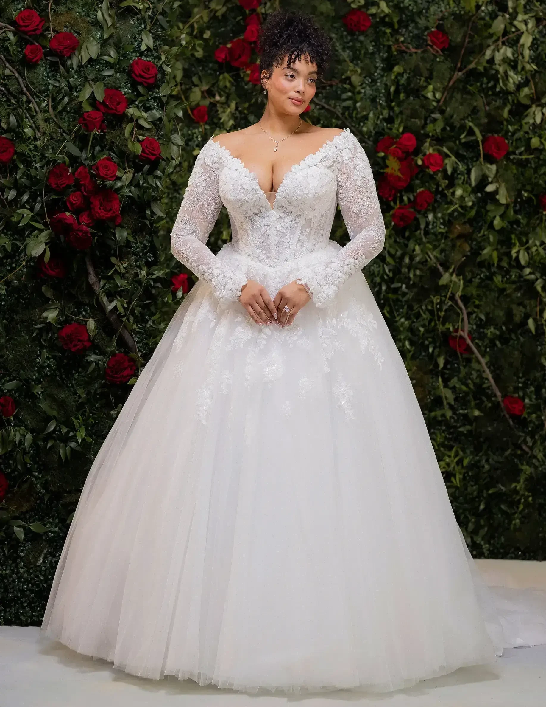 Model wearing a gown by Julietta By Morilee