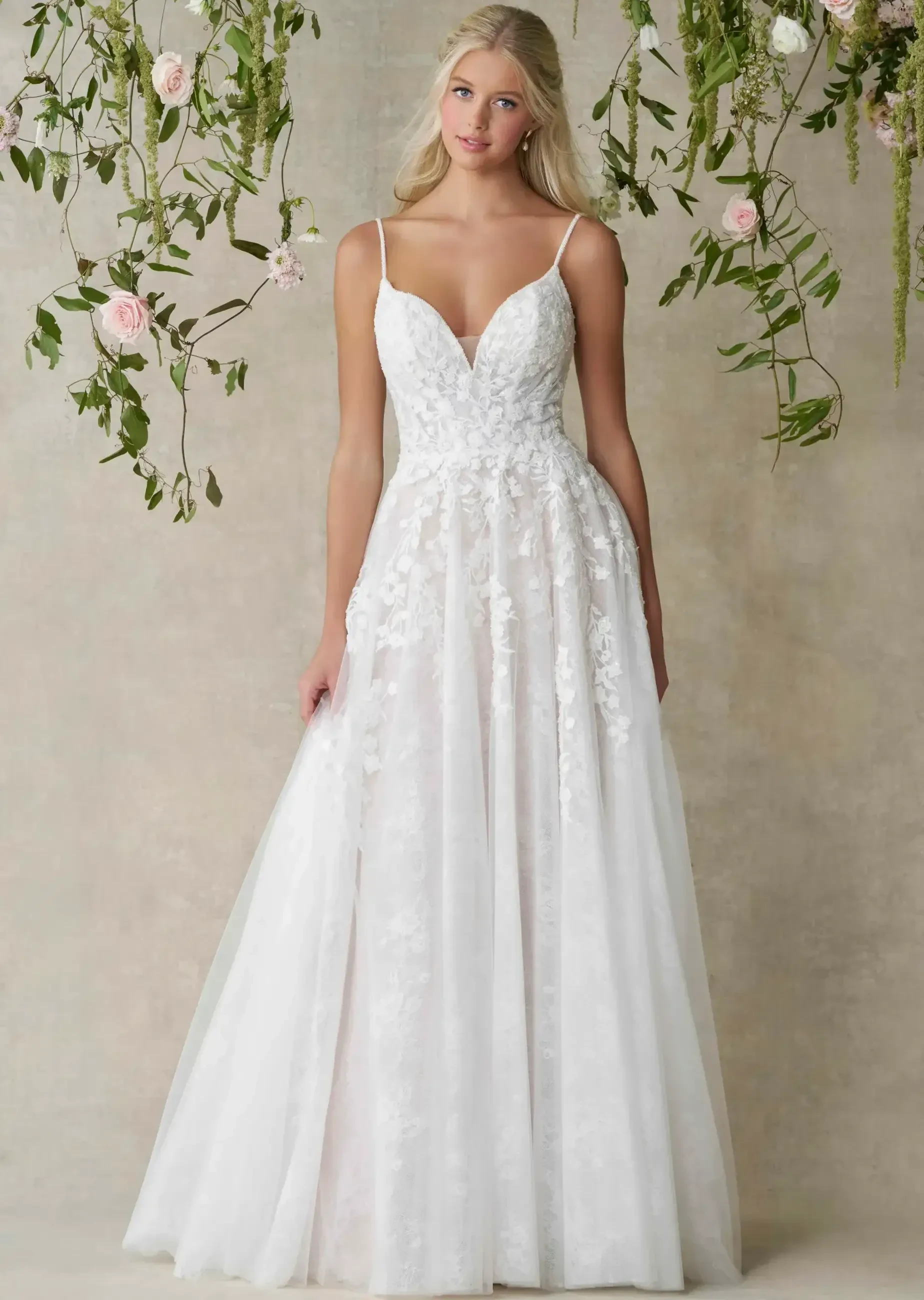 Model wearing a gown by Allure Romance