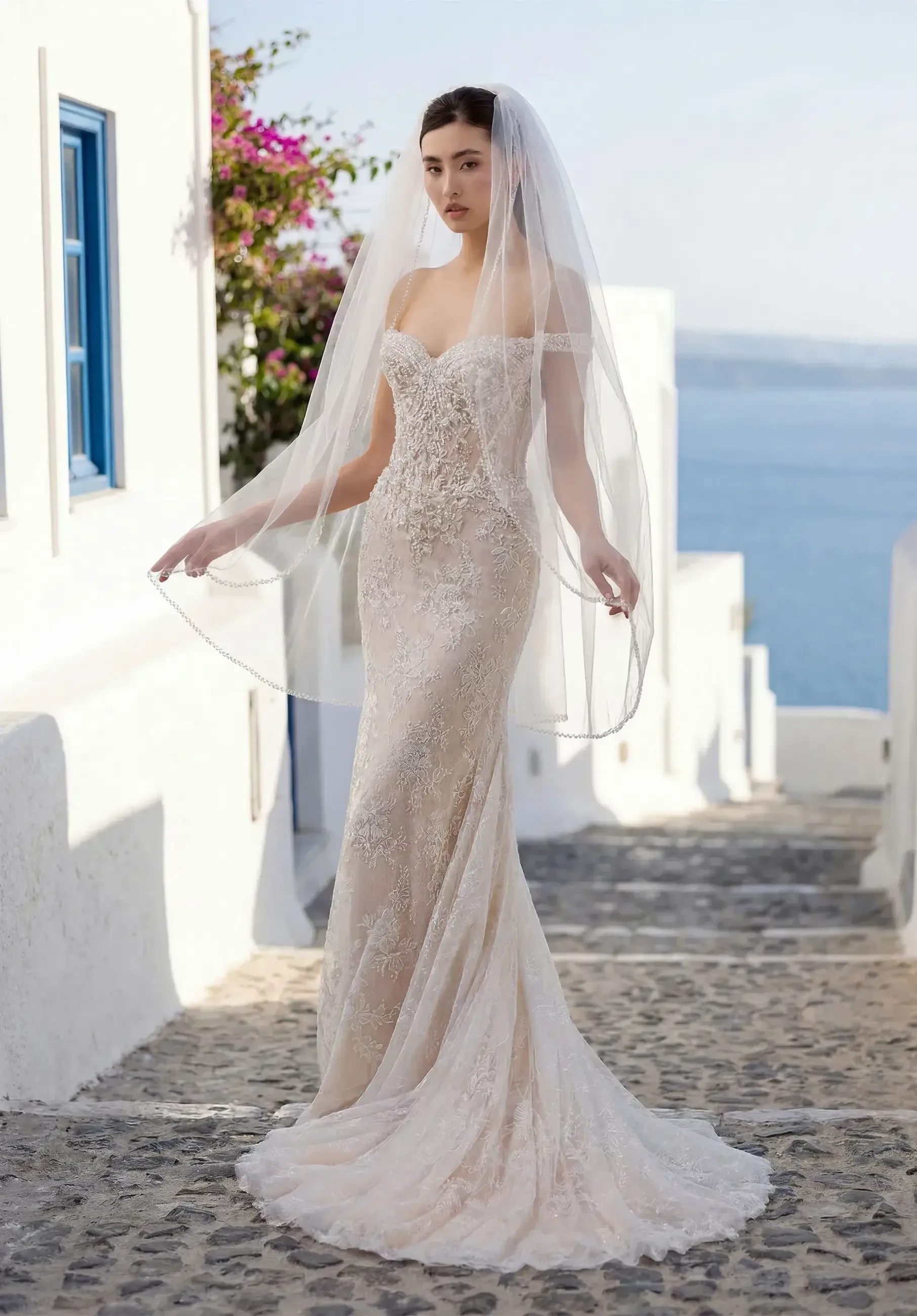 Model wearing a gown by Morilee